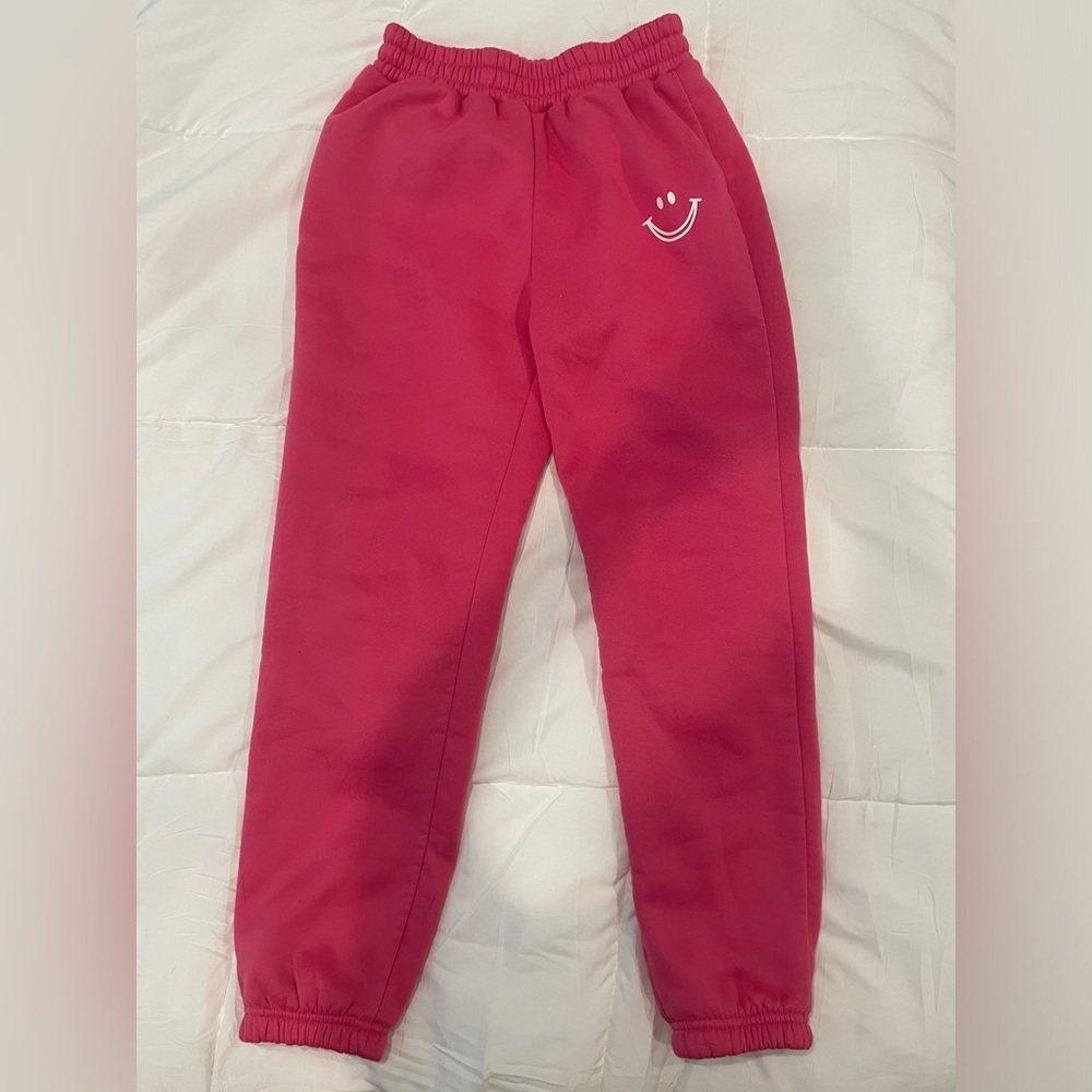 Women’s cozy smiley face sweatpants from SHEIN, barely worn.